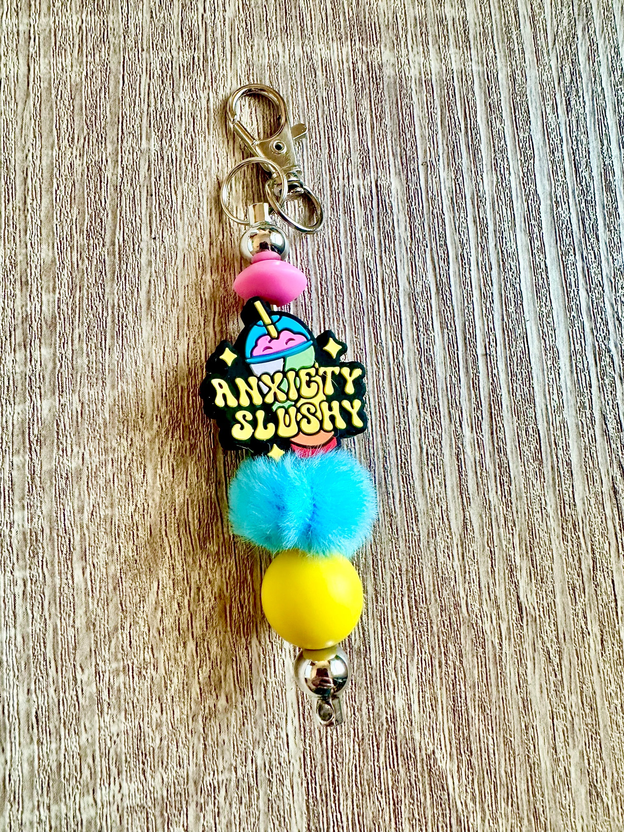 Coping Life handmade fidget keychain with wooden and silicone beads hanging on a key ring
