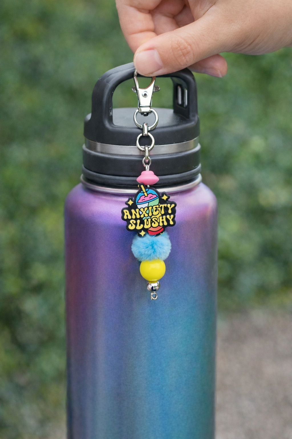 Coping Life handmade fidget keychain clipped to a water bottle showing portable everyday use